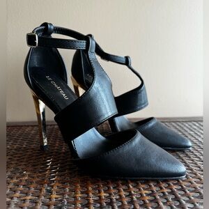 Black and gold high heels